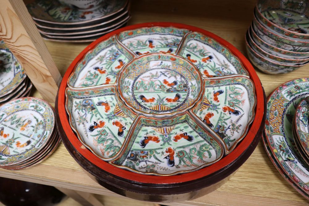 A collection of early 20th century Cantonese porcelain tea and dinnerwares, including an hors doeuvres set, in a lacquer box